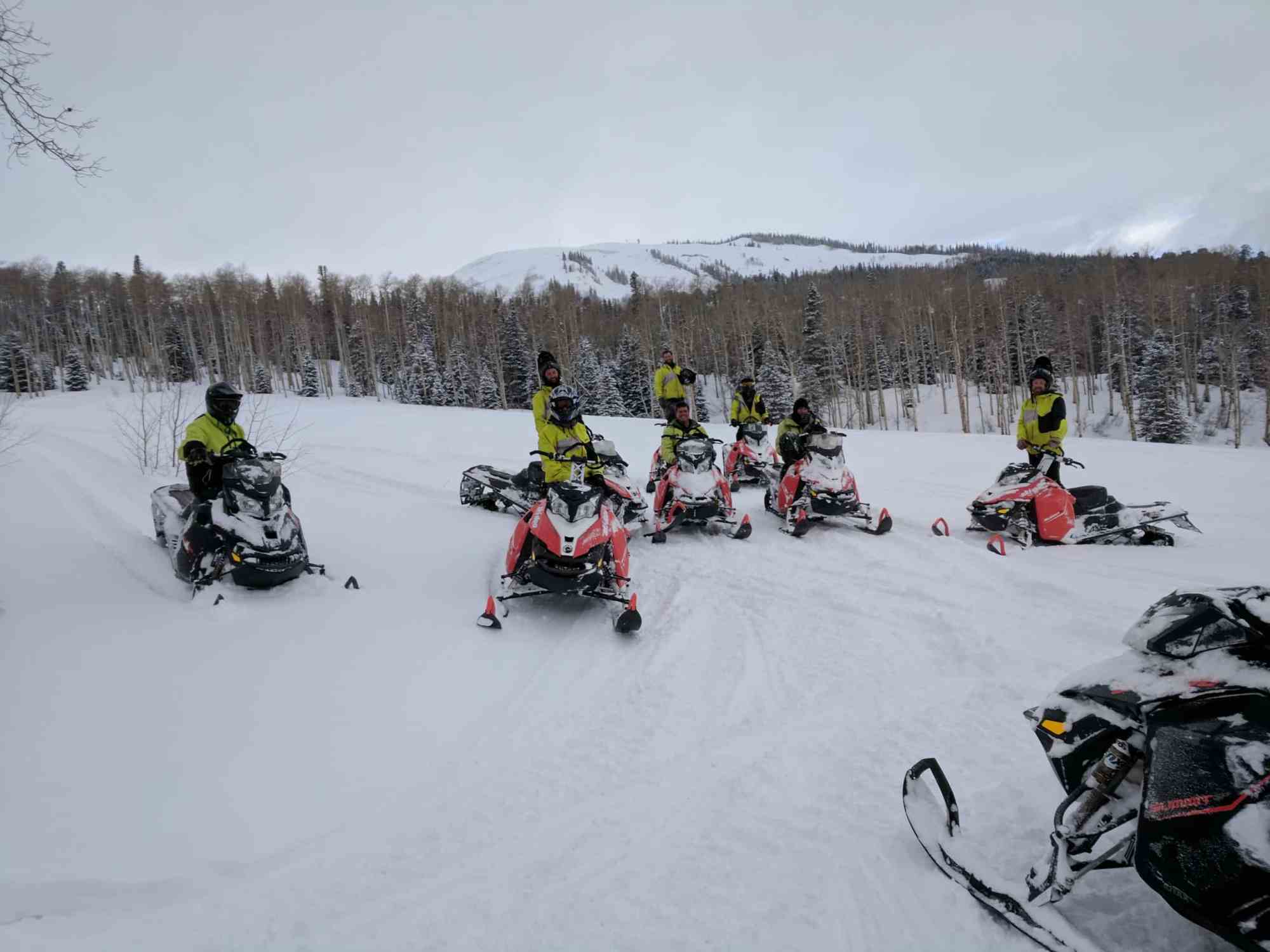 IMG_20170228_161733-scaled a group of people on snowmobiles