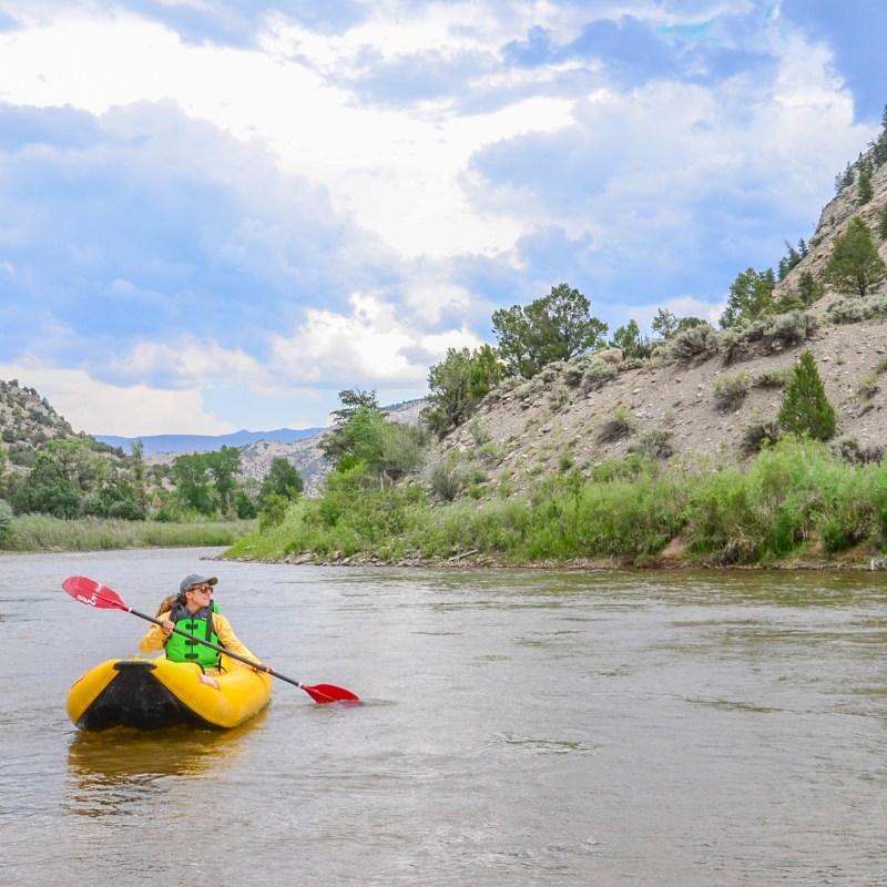 a small boat in a body of water