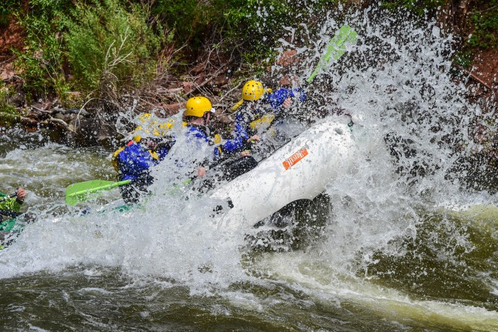 a person riding a wave on a surfboard in the water