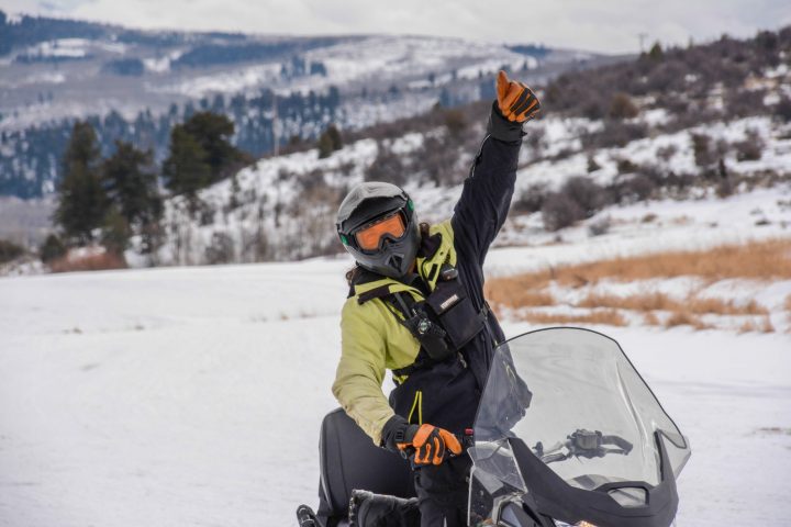 a person holding a snow board