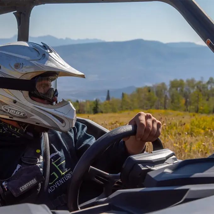 a person riding on the back of a motorcycle