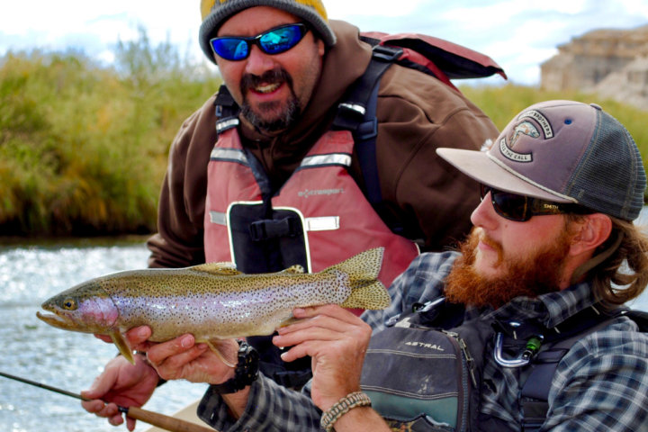 a man holding a fish